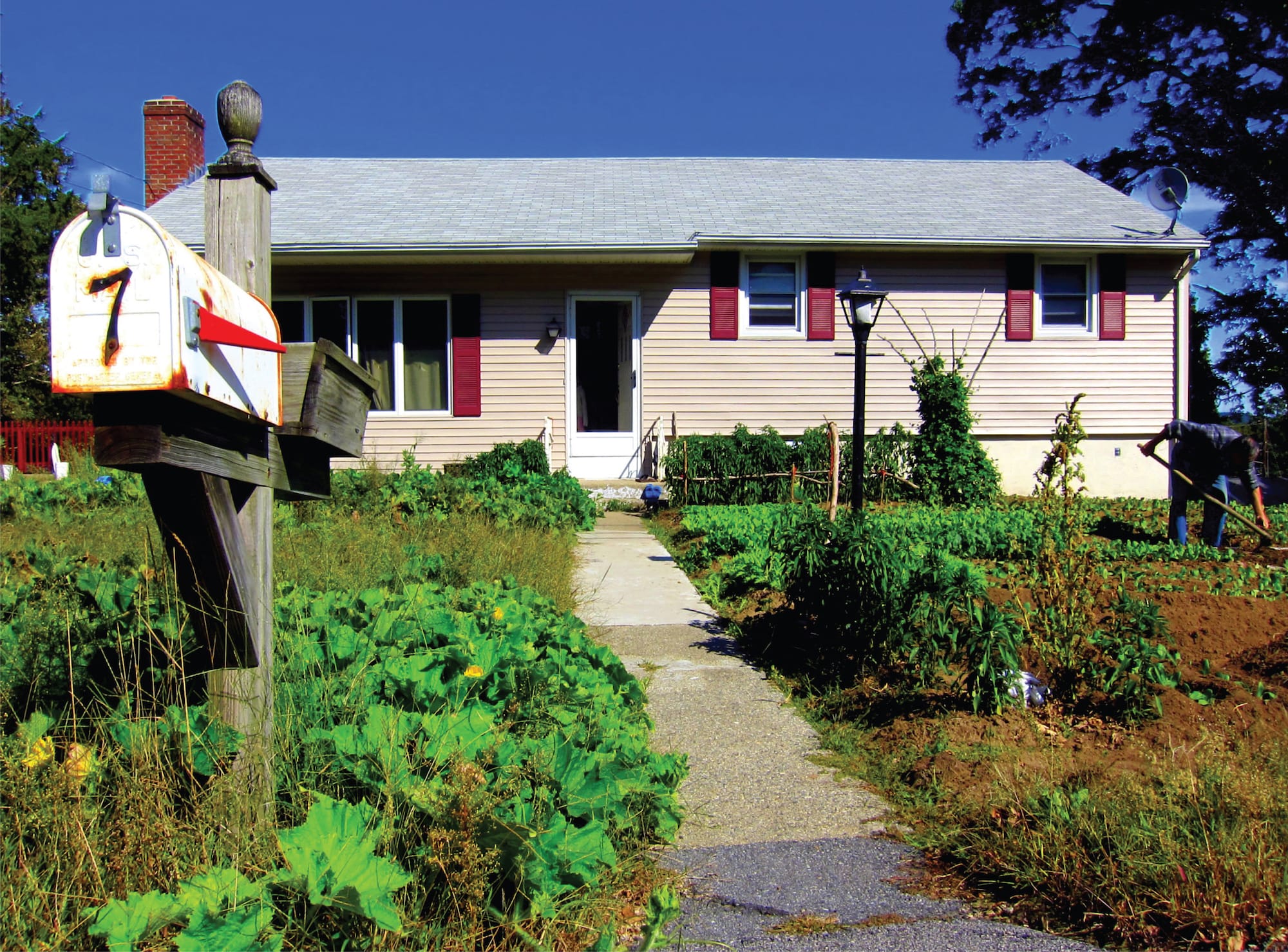 Chinese Immigrant Cultivating Their Front Lawn (Montville, Connecticut USA), 2012. © Stephen Fan.